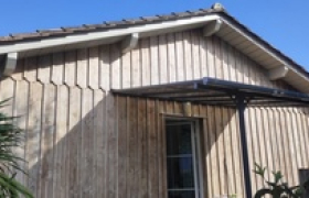 Saturateur de l’ossature bois et mise en opaque des volets